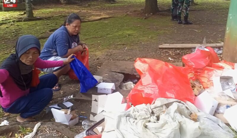 Dua ibu memunguti makanan sisa dari tumpukan sampah usai acara Hari Jadi Bogor (HJB) ke-543 di Lapangan Gedung Tegar Beriman, Selasa (3/6/2025). Potret kemiskinan ini menjadi ironi di tengah kemeriahan pesta rakyat./Dok.kanniadvokasi.id