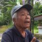 Purba, petani penggarap lahan eks PTP-11 di Desa Sukaluyu, Tamansari, Bogor, menyampaikan keluh kesahnya atas ancaman penggusuran oleh PT PMC, Kamis (10/7/2025).
