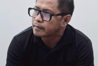 Kuasa hukum Sehan Ambaru, S.H., saat memberikan klarifikasi terkait pemberitaan sengketa lahan di Ratatotok.